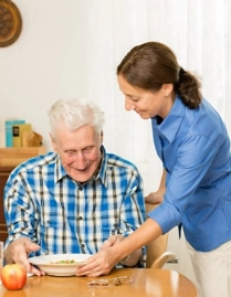 Paid family caregiver in Avon MA providing daily care and companionship to an elderly woman