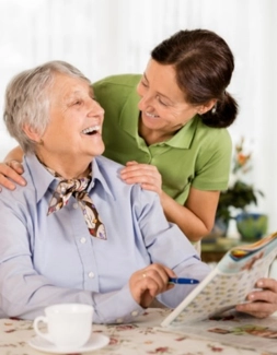Paid family caregiver in Stoughton MA providing companionship and support to an elderly woman